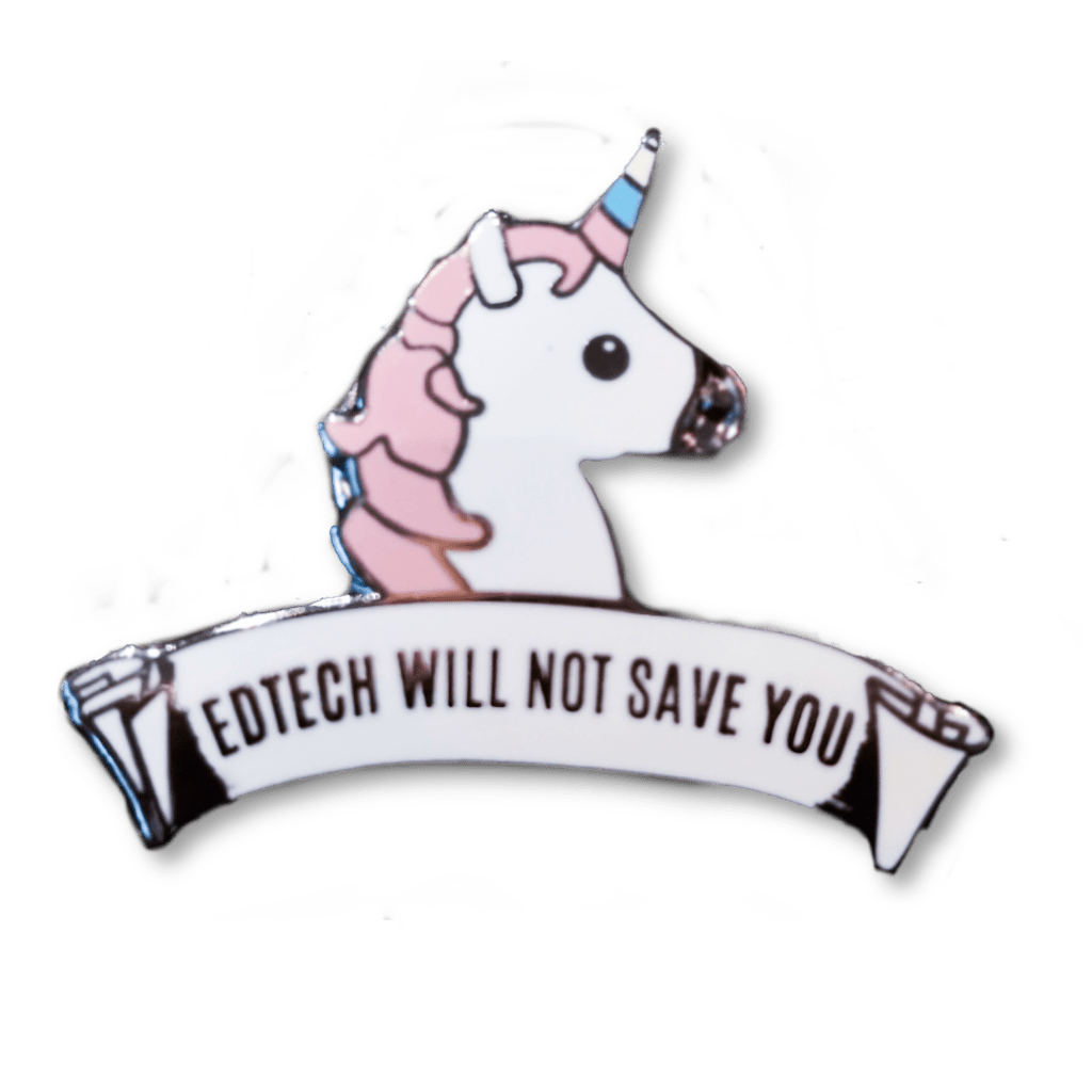 photo of a unicorn pin with the label: Edtech will not save you. I won it during the ALT conference a couple of years ago
