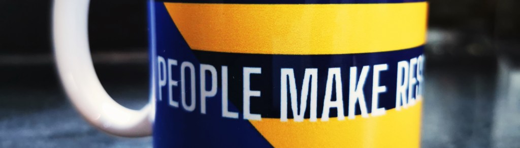 photo of the people make research mug
